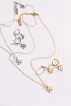 Puzzle Piece Huggie Hoops
