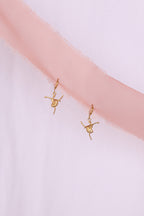 Tiny Dancer Huggie Hoop